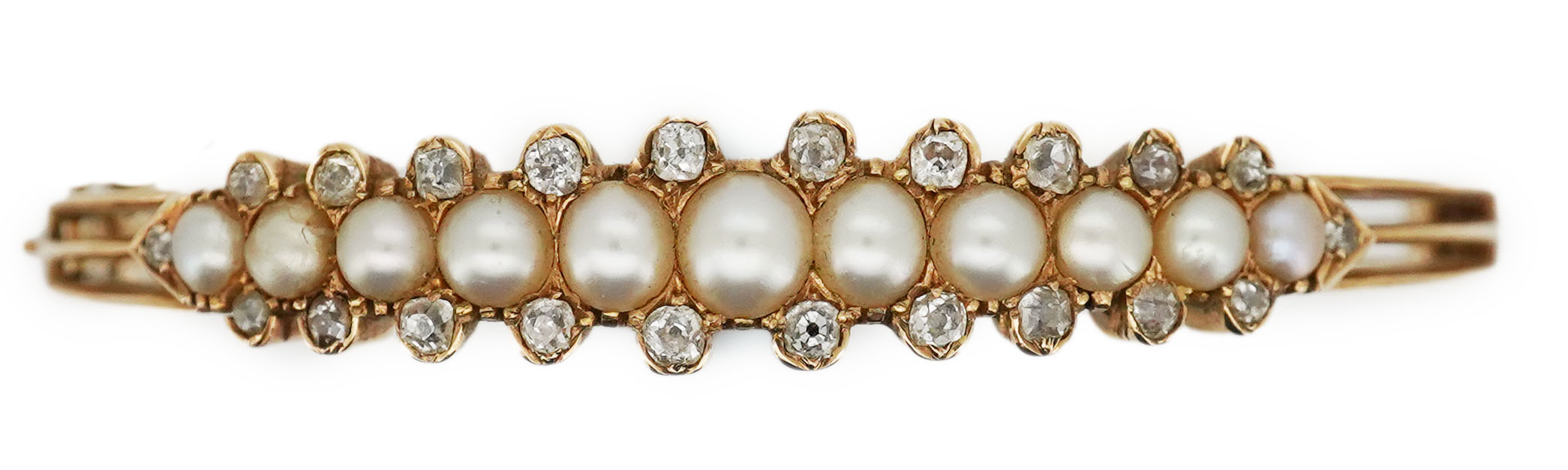 An Edwardian pearl and diamond bangle, early 20th century